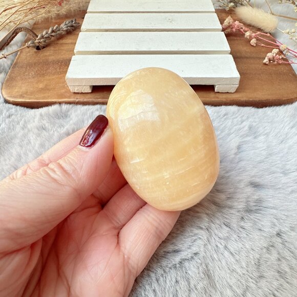Beautiful Orange Calcite Palm Stone - Picture 4 of 6